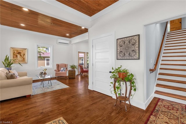225 Main St E, Pilot Mountain, NC 27041 - living area featuring wood ceiling, stairs, an AC wall unit, recessed lighting, and wood finished floors