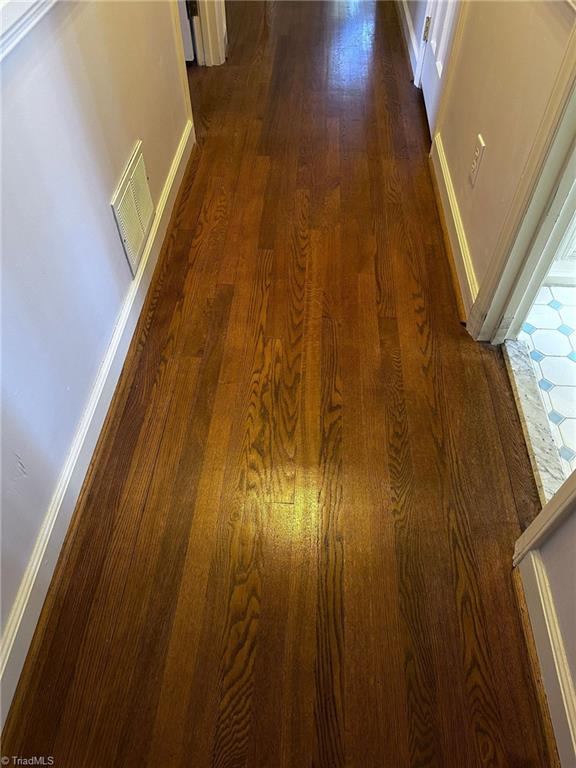 details featuring wood-type flooring