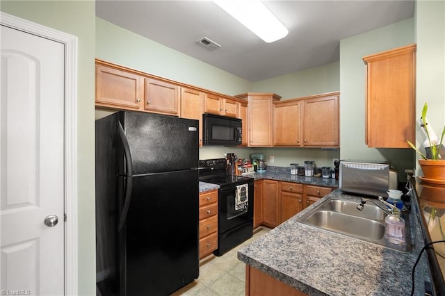 5430 Forester Dr, High Point, NC 27265 - kitchen featuring black appliances and a sink
