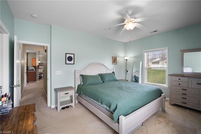 5430 Forester Dr, High Point, NC 27265 - bedroom featuring light carpet and ceiling fan