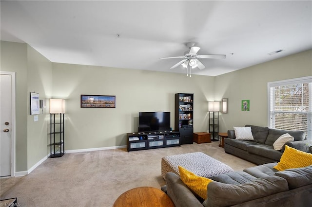 5430 Forester Dr, High Point, NC 27265 - carpeted living area featuring a ceiling fan and baseboards