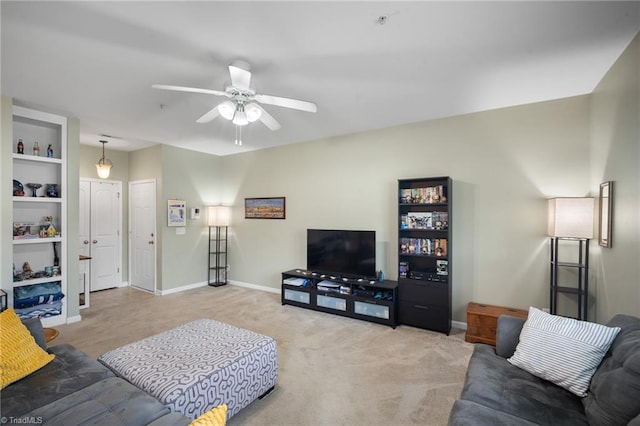 5430 Forester Dr, High Point, NC 27265 - carpeted living room featuring a ceiling fan and baseboards