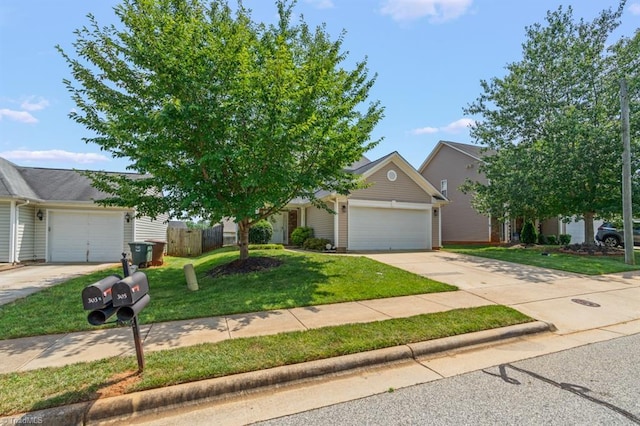 305 Apple Ridge Rd, Greensboro, NC 27406 - view of property hidden behind natural elements featuring a garage, a front yard, and concrete driveway