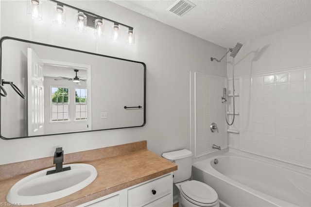 305 Apple Ridge Rd, Greensboro, NC 27406 - bathroom with vanity, bathing tub / shower combination, a ceiling fan, and a textured ceiling