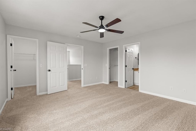 305 Apple Ridge Rd, Greensboro, NC 27406 - unfurnished bedroom with a spacious closet, a closet, light carpet, and ceiling fan