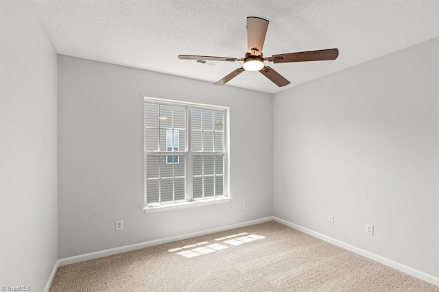 305 Apple Ridge Rd, Greensboro, NC 27406 - carpeted spare room with a ceiling fan and a textured ceiling