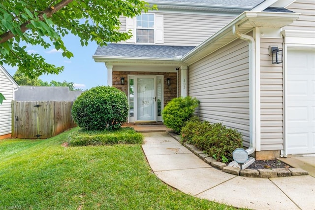 305 Apple Ridge Rd, Greensboro, NC 27406 - entrance to property with an attached garage, roof with shingles, and stone siding