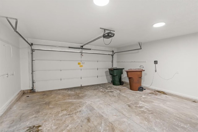 305 Apple Ridge Rd, Greensboro, NC 27406 - garage with a garage door opener and baseboards