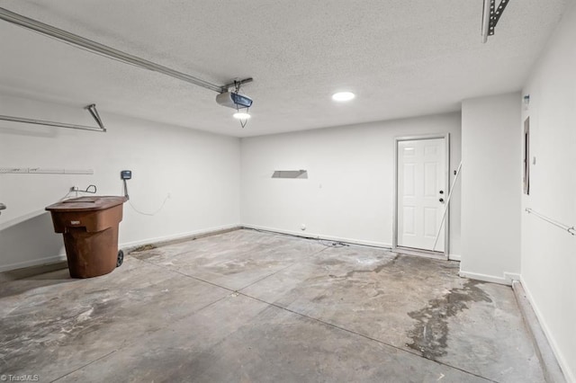 305 Apple Ridge Rd, Greensboro, NC 27406 - garage with a garage door opener and baseboards