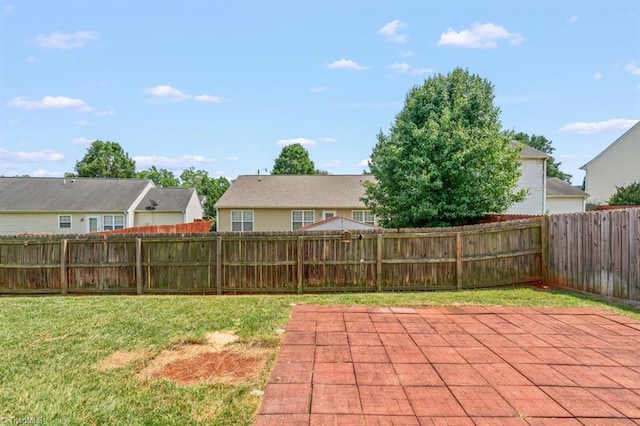 305 Apple Ridge Rd, Greensboro, NC 27406 - fenced backyard featuring a patio area and a residential view