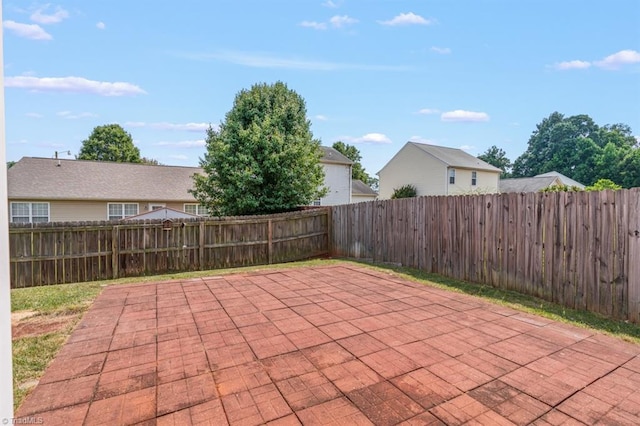 305 Apple Ridge Rd, Greensboro, NC 27406 - fenced backyard with a patio area