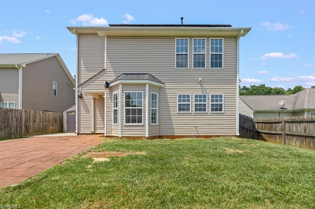 305 Apple Ridge Rd, Greensboro, NC 27406 - back of house featuring a fenced backyard