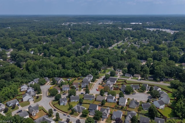 305 Apple Ridge Rd, Greensboro, NC 27406 - aerial view of property and surrounding area with a heavily wooded area and nearby suburban area