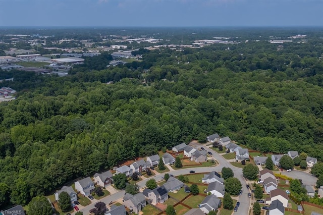305 Apple Ridge Rd, Greensboro, NC 27406 - aerial perspective of suburban area with a heavily wooded area