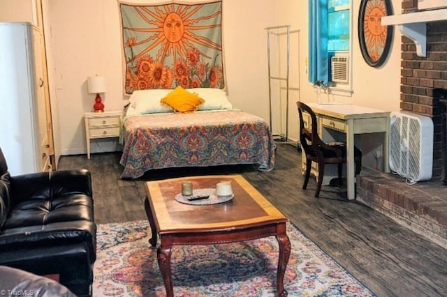 bedroom with wood finished floors