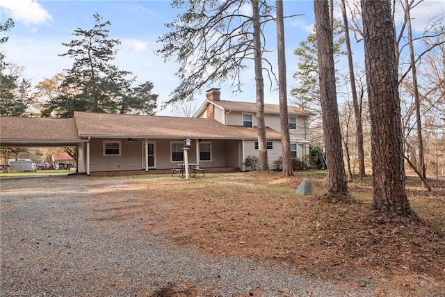 front of property featuring a carport