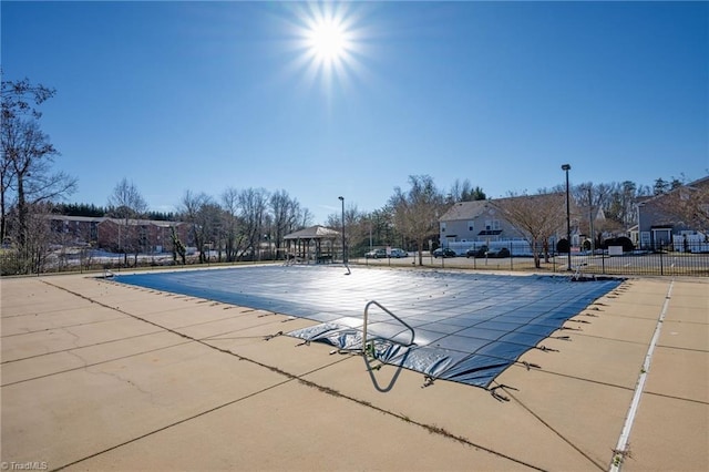 view of swimming pool featuring a gazebo