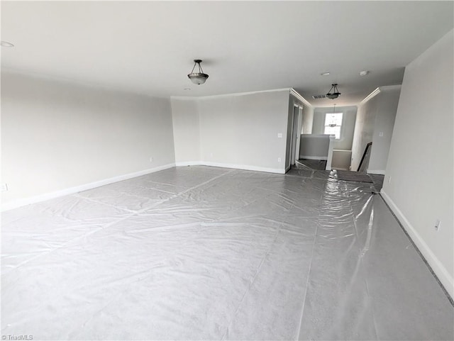 750 Palomino Mustang Dr Unit 692, Whitsett, NC 27377 - spare room with baseboards and concrete floors