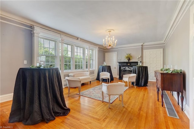 17 E Main St, Thomasville, NC 27360 - sitting room featuring a chandelier, crown molding, and a fireplace