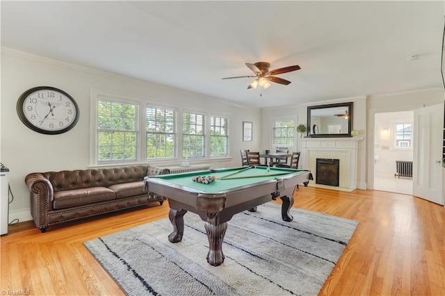 17 E Main St, Thomasville, NC 27360 - playroom featuring a ceiling fan, crown molding, pool table, light wood-style floors, and a fireplace with flush hearth