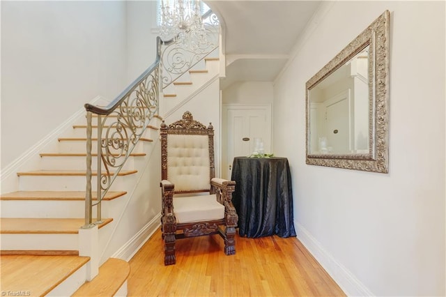 17 E Main St, Thomasville, NC 27360 - stairs with wood finished floors and a chandelier