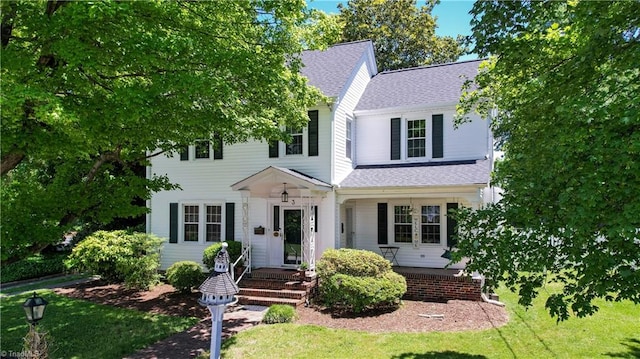 17 E Main St, Thomasville, NC 27360 - view of front facade featuring a shingled roof and a porch