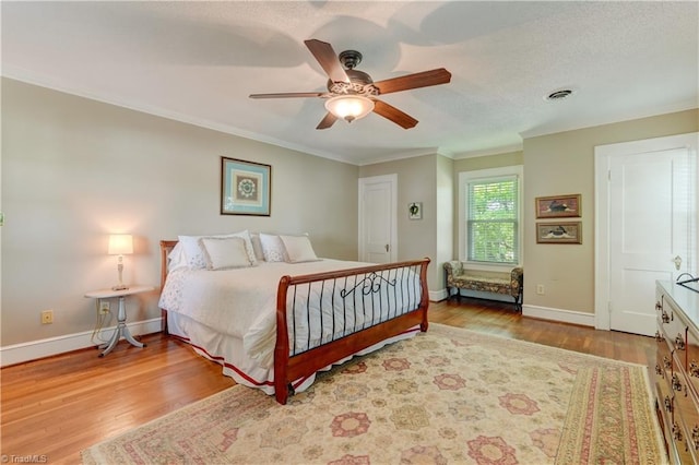 17 E Main St, Thomasville, NC 27360 - bedroom featuring wood finished floors, ornamental molding, and ceiling fan