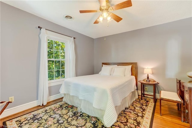 17 E Main St, Thomasville, NC 27360 - bedroom featuring light wood-style flooring and ceiling fan