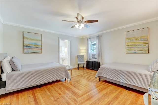17 E Main St, Thomasville, NC 27360 - bedroom with radiator heating unit, crown molding, light wood-type flooring, a ceiling fan, and ensuite bath
