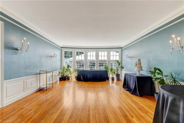17 E Main St, Thomasville, NC 27360 - living room with a chandelier, crown molding, and light wood-style floors