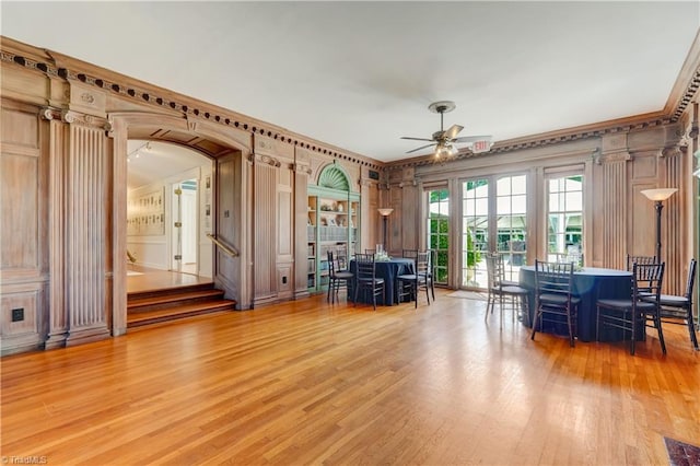 17 E Main St, Thomasville, NC 27360 - living room with a ceiling fan, crown molding, wood finished floors, stairway, and arched walkways