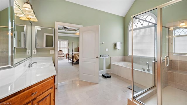 full bath with vanity, a shower stall, a bath, and vaulted ceiling