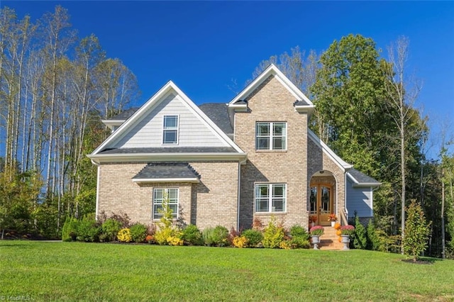 view of front of home with a front yard