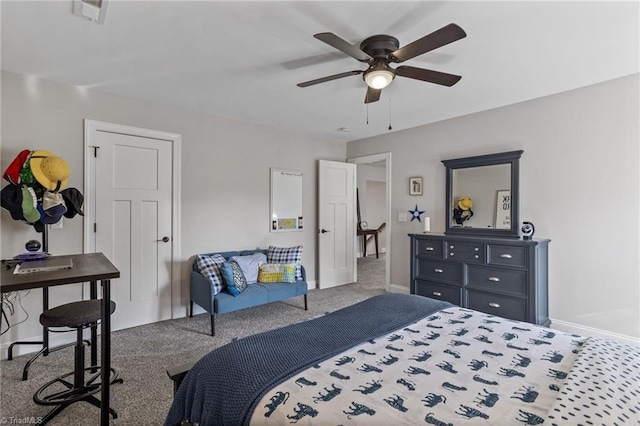 bedroom with ceiling fan and carpet flooring