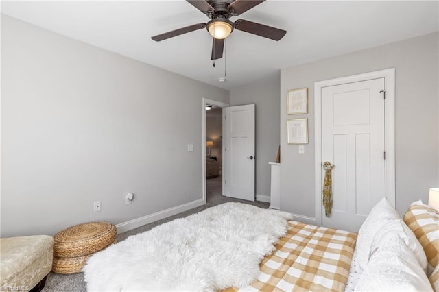 bedroom with ceiling fan and carpet floors