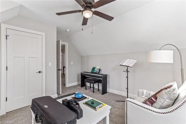 living area featuring ceiling fan, light carpet, and lofted ceiling