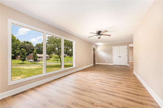4353 Valley View Rd, Thomasville, NC 27370 - empty room featuring baseboards, light wood-type flooring, and ceiling fan