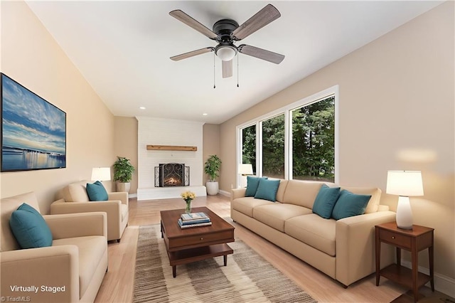 4353 Valley View Rd, Thomasville, NC 27370 - living area featuring light wood-style floors, a ceiling fan, baseboards, recessed lighting, and a fireplace