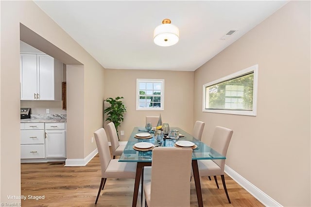 4353 Valley View Rd, Thomasville, NC 27370 - dining area with light wood-style flooring and baseboards