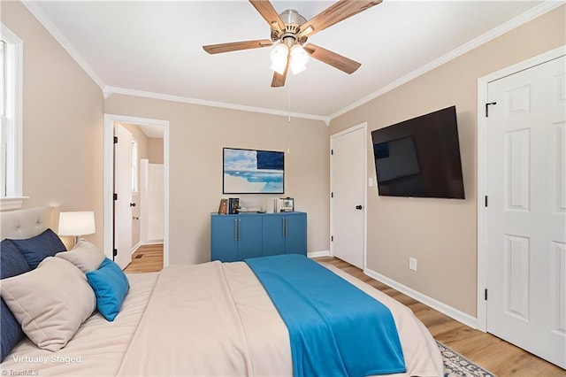 4353 Valley View Rd, Thomasville, NC 27370 - bedroom with crown molding, wood finished floors, baseboards, ensuite bathroom, and ceiling fan