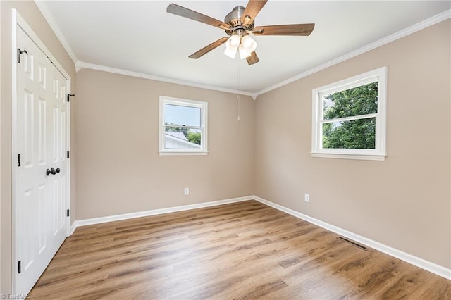 4353 Valley View Rd, Thomasville, NC 27370 - unfurnished bedroom with baseboards, crown molding, light wood-style floors, a closet, and a ceiling fan