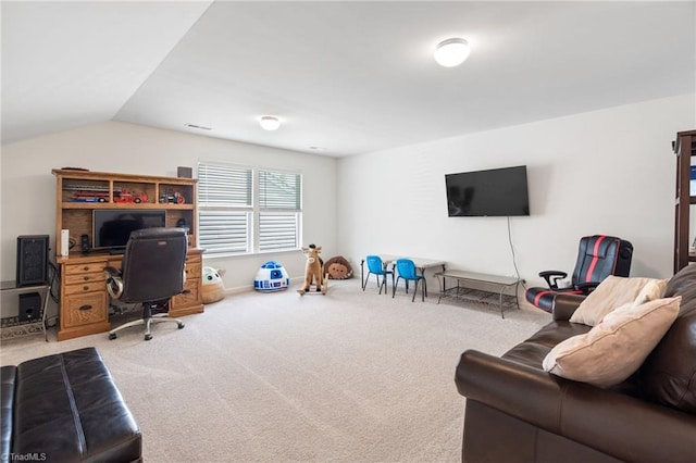 office area featuring carpet flooring and lofted ceiling