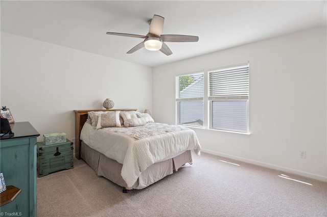 bedroom with ceiling fan and carpet flooring