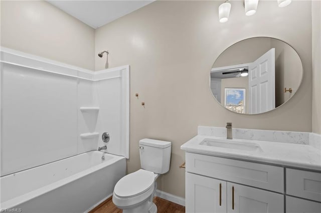 full bathroom with toilet, vanity, ceiling fan, shower / bath combination, and hardwood / wood-style floors