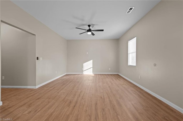 unfurnished room featuring ceiling fan and light wood-type flooring