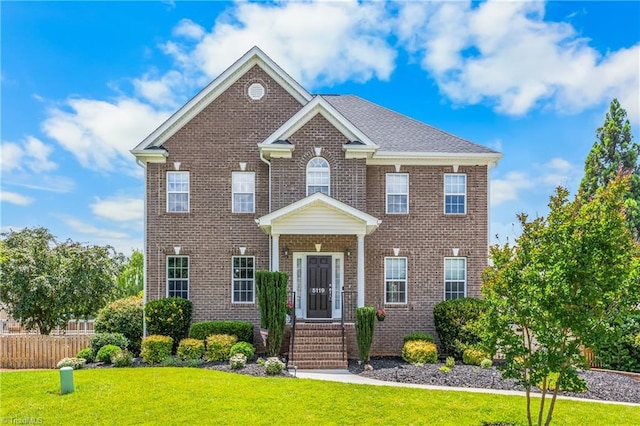 5119 Spiral Wood Dr, Clemmons, NC 27012 - colonial home featuring brick siding