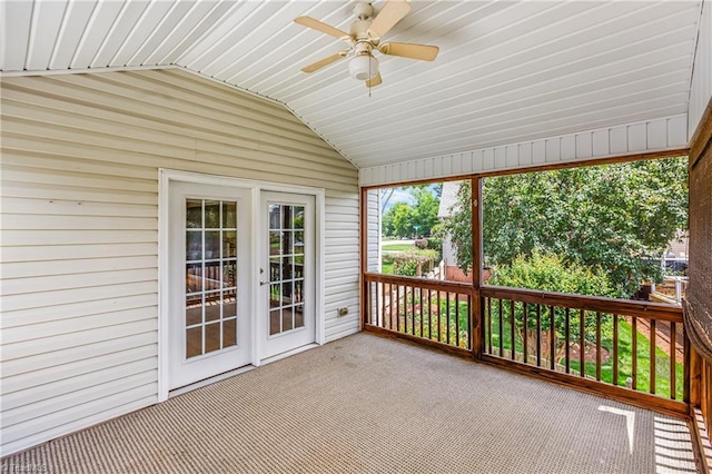 5119 Spiral Wood Dr, Clemmons, NC 27012 - unfurnished sunroom with a ceiling fan, vaulted ceiling, carpet floors, and wooden walls