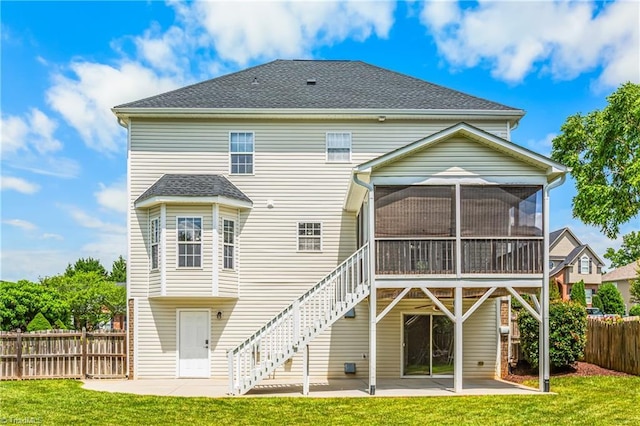 5119 Spiral Wood Dr, Clemmons, NC 27012 - back of property featuring a sunroom, a patio, stairway, and a shingled roof