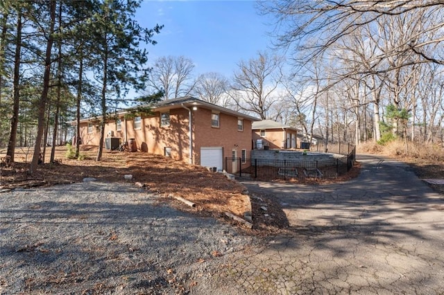 view of property exterior with cooling unit