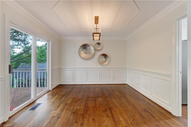 1807 Millhouse Ct, Greensboro, NC 27407 - spare room with dark wood finished floors, ornamental molding, wainscoting, and a decorative wall